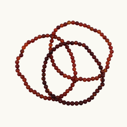 Carnelian Beaded Bracelets - Boost your confidence and courage with our Carnelian bracelets, perfect for enhancing vitality and creativity. Available in 4mm and 10mm sizes, each bracelet is uniquely chosen for you.