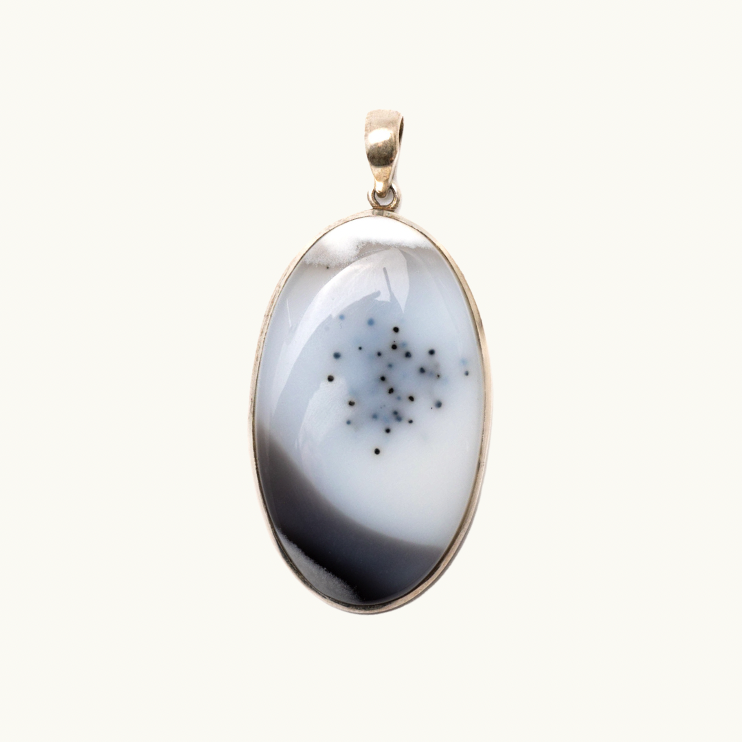 Dendritic Opal Pendant - Experience the magic of life with our Dendritic Opal pendant. Stone roughly measures 2.25". Each pendant is uniquely chosen for you.