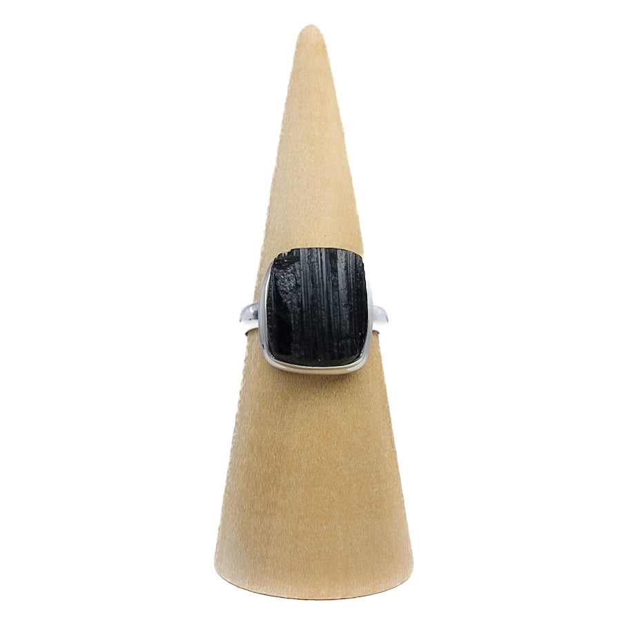 Raw black tourmaline ring representing negative energy cleansing and protection. Shop now