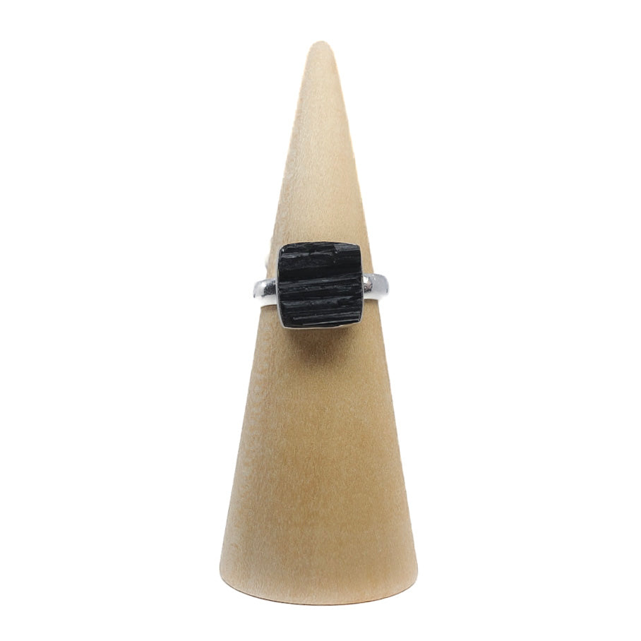 Raw black tourmaline ring representing negative energy cleansing and protection. Shop now