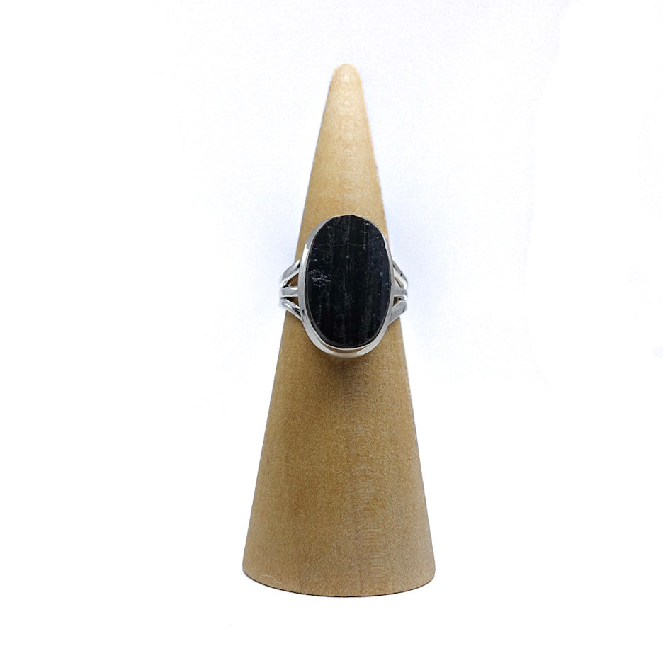 Raw black tourmaline ring representing negative energy cleansing and protection. Shop now