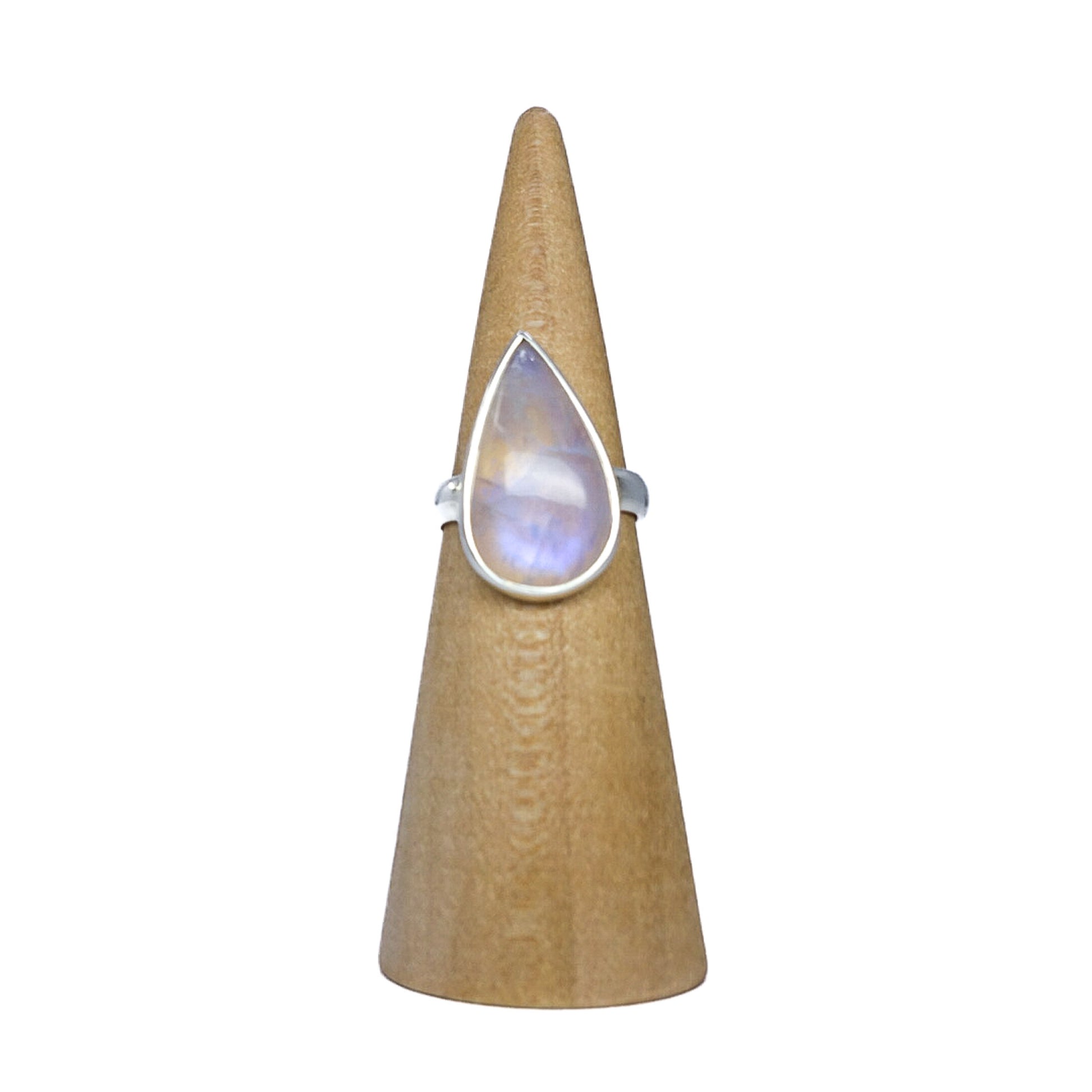 Moonstone ring representing nurturing energy, love, and fertility. Pairs with Staurolite and Jade. Shop now for crystal jewelry!