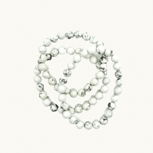 Howlite Beaded Bracelets - Experience tranquility and anxiety relief with our Howlite bracelets, perfect for promoting restful sleep and releasing muscle tension. Available in 8mm size, each bracelet is uniquely chosen for you.